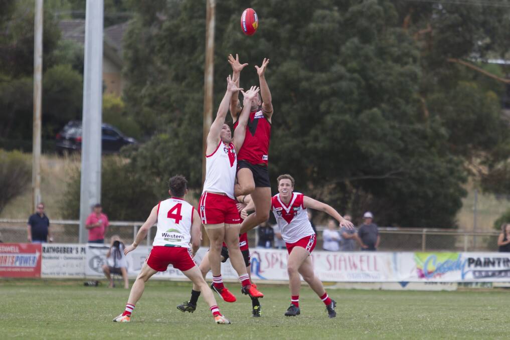 FLYING HIGH: Ararat and Stawell facing off in the 2017 Good Friday fixture. Picture: PETER PICKERING