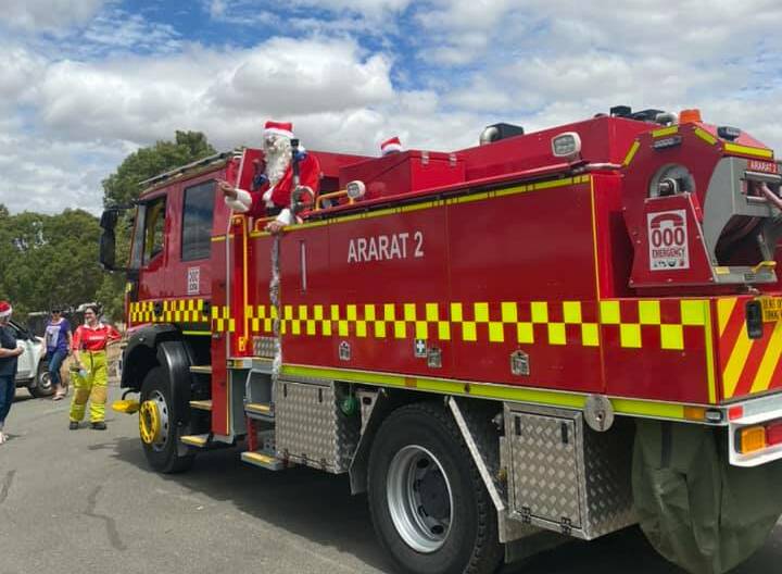Santa enjoyed a tour of Ararat from atop one of the brigade's trucks. Picture: SUPPLIED
