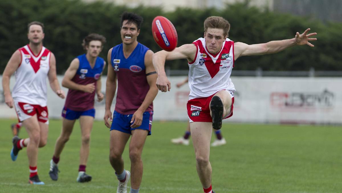 PUNT: Ararat's Dylan Woods launches the ball up-field. Picture: PETER PICKERING