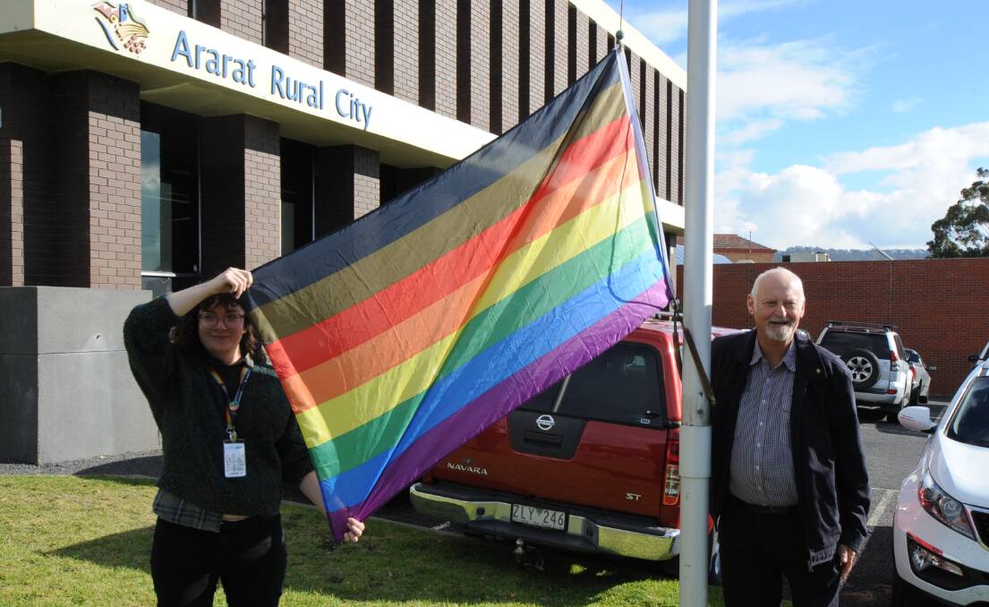 FLAG RAISING: GCH health promotions officer and Ararat Rural City Council deputy mayor Peter Beales raising the rainbow flag. Picture: KLAUS NANNESTAD