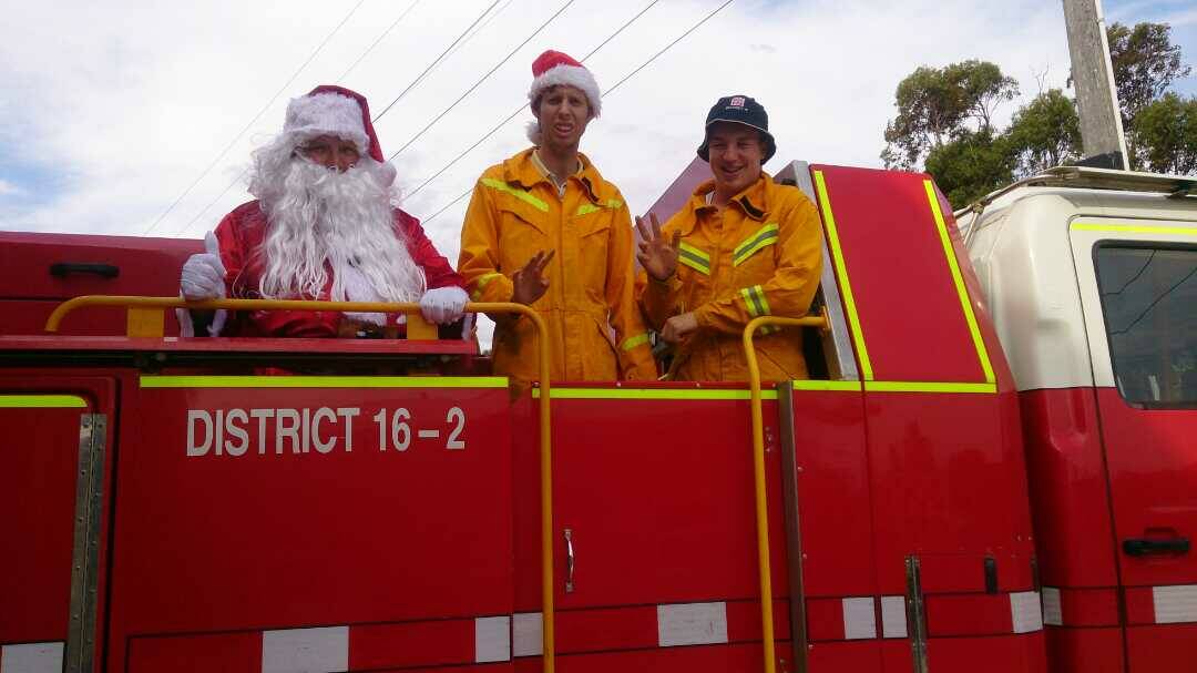 Santa and a couple of his helpers from the Willaura Fire Brigade at a previous Santa in the Park. Picture: SUPPLIED