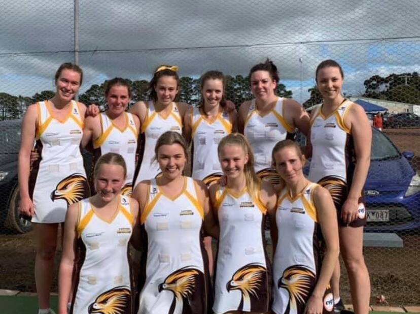 HAWKS: Jessica Whiteside (front row: second from the left) with her team. Picture: CONTRIBUTED