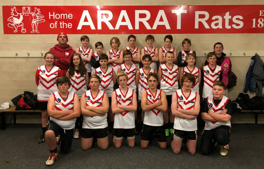RED AND WHITE: Scott Turner with Ararat's 2018 Turner-Tuckey Challenge side. Jim Jennings was named as Ararats best player Picture: FILE