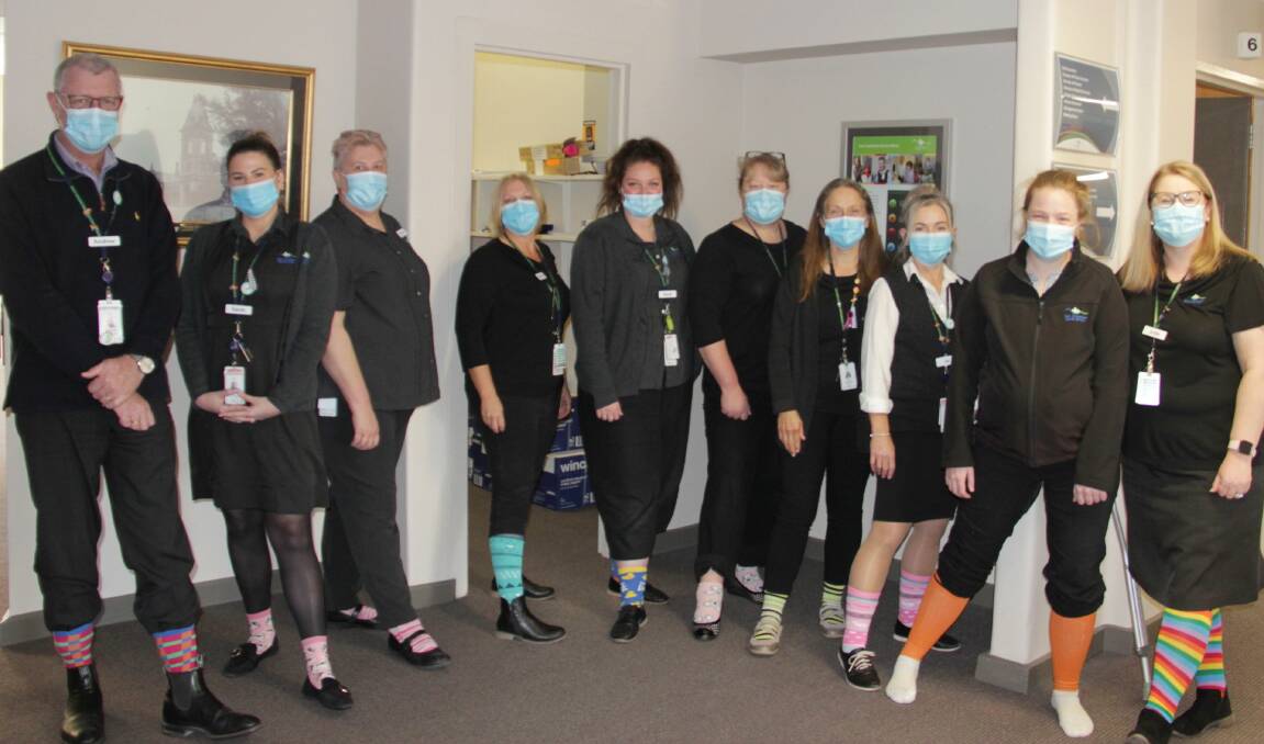 SOCK ON: East Grampians Health Services staff brighten up the workplace for Crazy Sock Day. Pictures: CONTRIBUTED