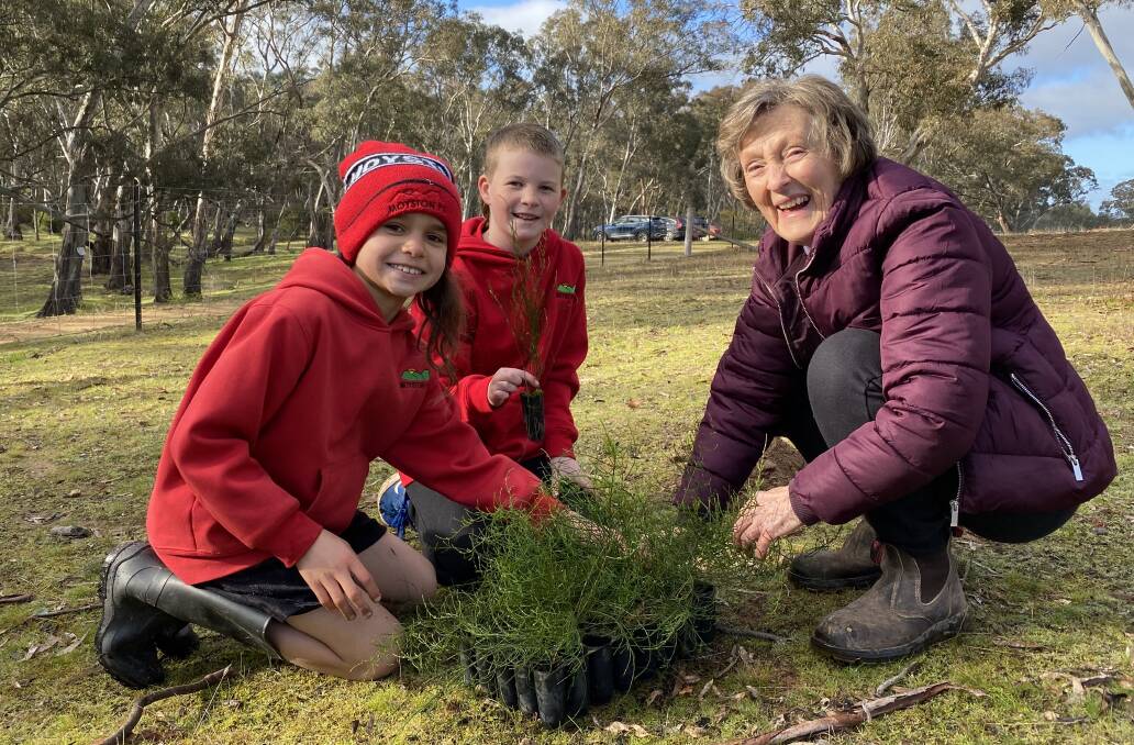 LANDCARE: Moyston Primary School students help Moyston Landcare with their planting efforts. Picture: CONTRIBUTED