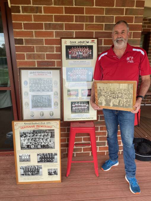 SUCCESS: Ararat Rats clubman Michael Spalding with the premiership photos of 1911, 1951, 1971 and 2001. Picture: CONTRIBUTED