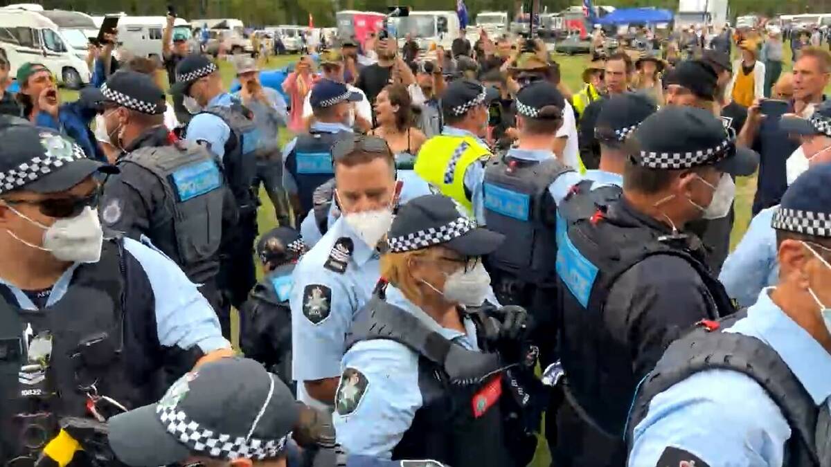 Three people at anti-vax campsite to be charged as police fail to move group on