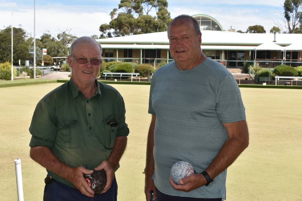 OUT AND ABOUT: Geoff Wilkinson and Hans Holz have a roll at the Chalambar rinks on Wednesday. Picture: JAMES HALLEY