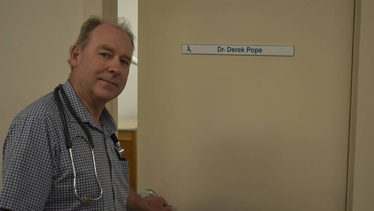 ENDING: Dr Pope closing the door on his 36 year career. Picture: JAMES HALLEY