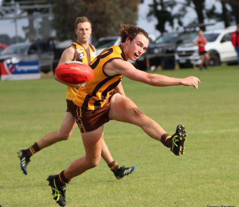 SNAP: Tatyoon's Will Henderson kicking the ball against Penshurst in round three. Picture: CONTRIBUTED, TRACEY KRUGER. 