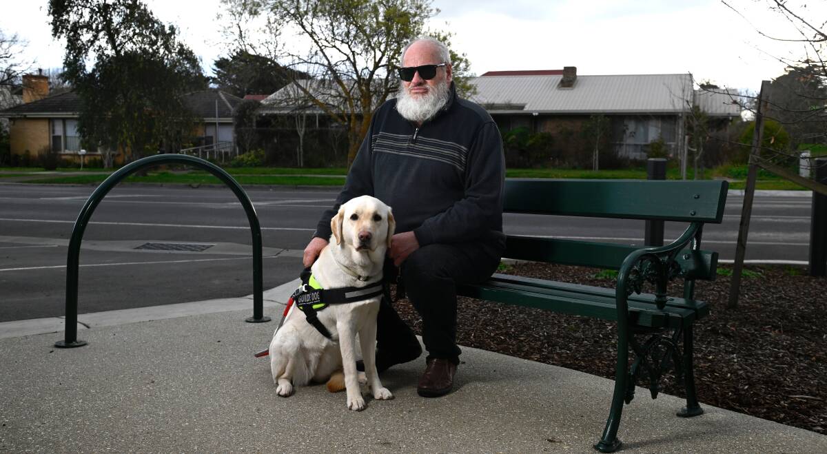 Buninyong resident David Morrison has had several taxis allegedly cancel on him after seeing he has a guide dog, Petra. Picture by Adam Trafford