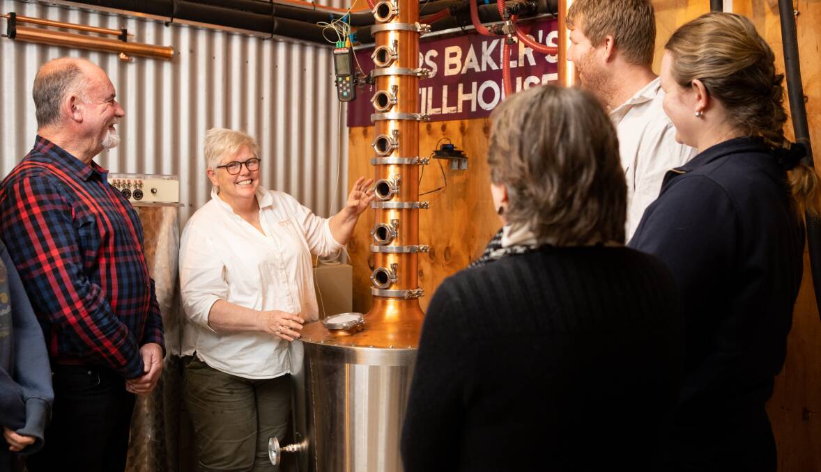Jane Baker (second, left) will help visitors create their own custom blend of gin. Picture contributed.