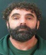 Daniel Briffa, 50, is 170cm tall and would have been wearing a forest green tracksuit at the time of his escape. Picture Victoria Police.