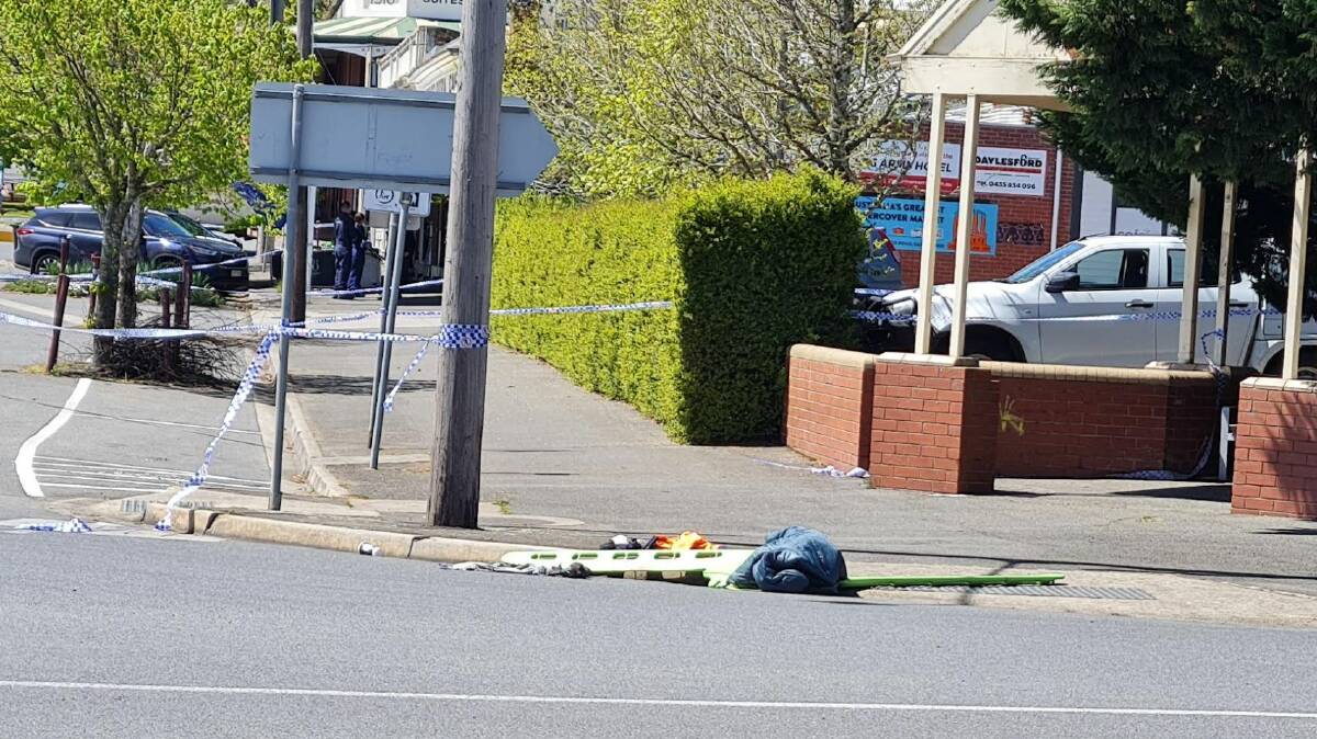 A jacket and other clothing were left with a stretcher outside the Daylesford Coles carpark after Tuesday's dawn incident. Police want to hear from drivers who may have passed through before 6.30am. Picture by Gabrielle Hodson.
.
