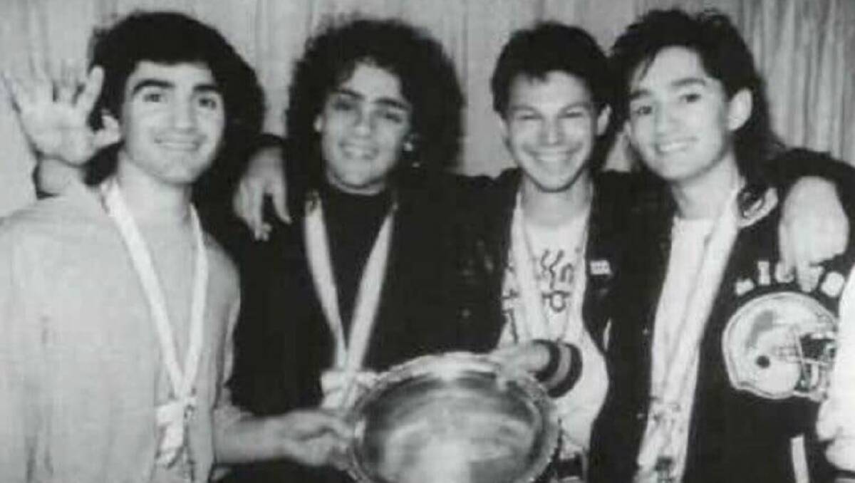 Pierre Pierre (Gigliotti), Vince Leigh (songwriter), Brian Canham (lyricist) and James Leigh at Tokyo's Budokan with the 1987 international award for Take on the World - inspired by Steve Moneghetti. Picture supplied by Pseudo Echo. 