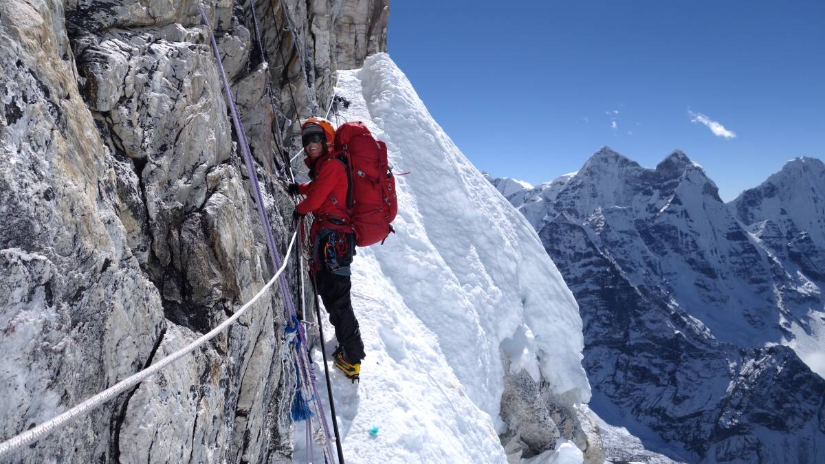 On the way up: Leah Jay traversing through the mountains on her Mount Everest trek.