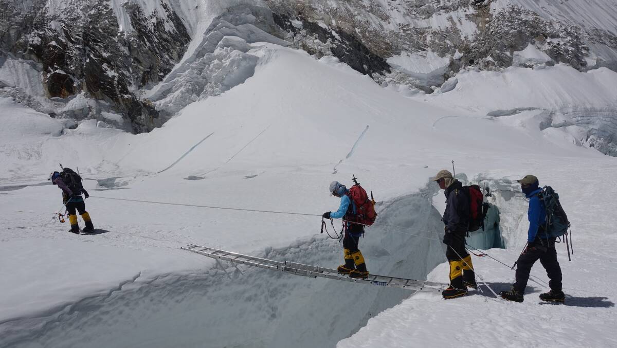 Incredibly difficult: Leah Jay crossing a crevice on her Mount Everest trek.