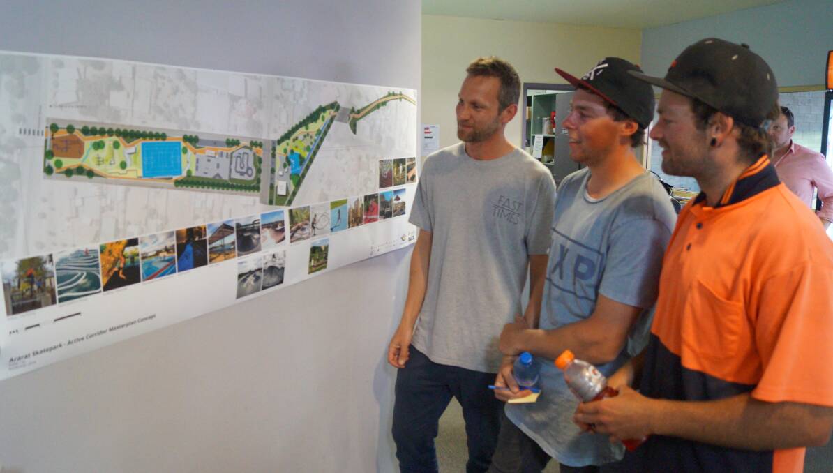 EXCITED: Baseplate architects' Darren White and Ararat residents Marcus Johnston and Scott O'Connor examine the plans. Picture: Jeremy Venosta