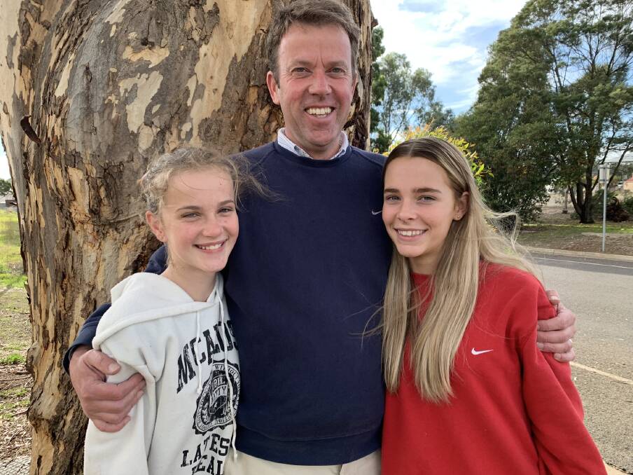 WHAT A WIN: Wannon Liberal MP Dan Tehan is delighted with his win and celebrated with his daughters Eleanor and Maya. 