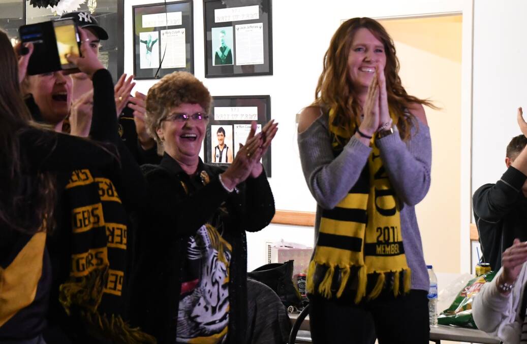 HE'S DONE IT: Dustin Martin's Nan, Lois Knight, and Aunty, Ange Dehany, at the Castlemaine Football-Netball Club social rooms at Camp Reserve the moment Martin won the Brownlow Medal on Monday night. Martin won the Brownlow with a record 36 votes. Picture: LUKE WEST