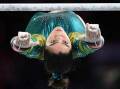 Georgia Godwin of Australia in action on the uneven bars. Photo: AAP Image/James Ross