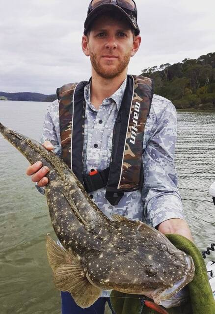 TOP CATCH: Joey Bourke with a great flathead caught on a soft plastic. Poor weather has made it tough for anglers. Picture: SUPPLIED 