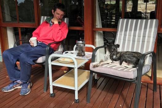 KEEPING SANE: Keith Lofthouse and Clarry, the Wonder Whippet, in social distancing mode. Picture: SUPPLIED