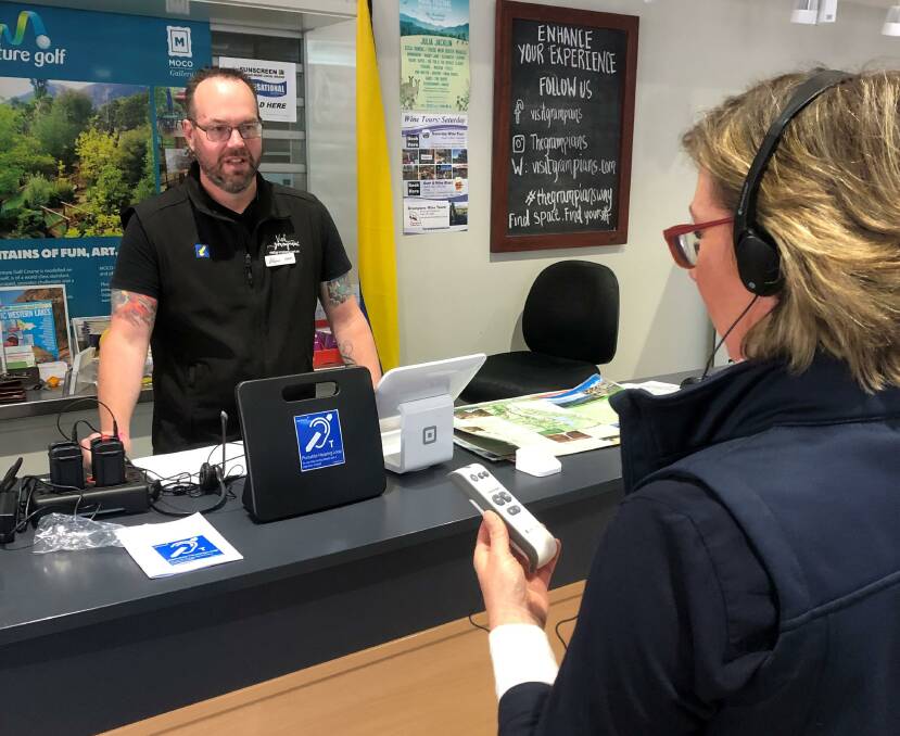 HEARING HELP: Jason Meehan and Helga Sparks, from Grampians Tourism, with the new equipment. Picture: SUPPLIED
