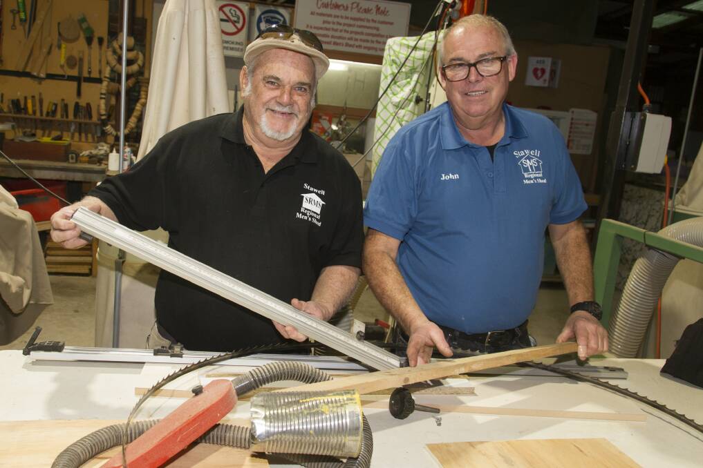 LOOKING FOR IDEAS: John Bradley and Alan Rees at Stawell's Men's Shed. The new directory will list groups to help people better explore the area. 