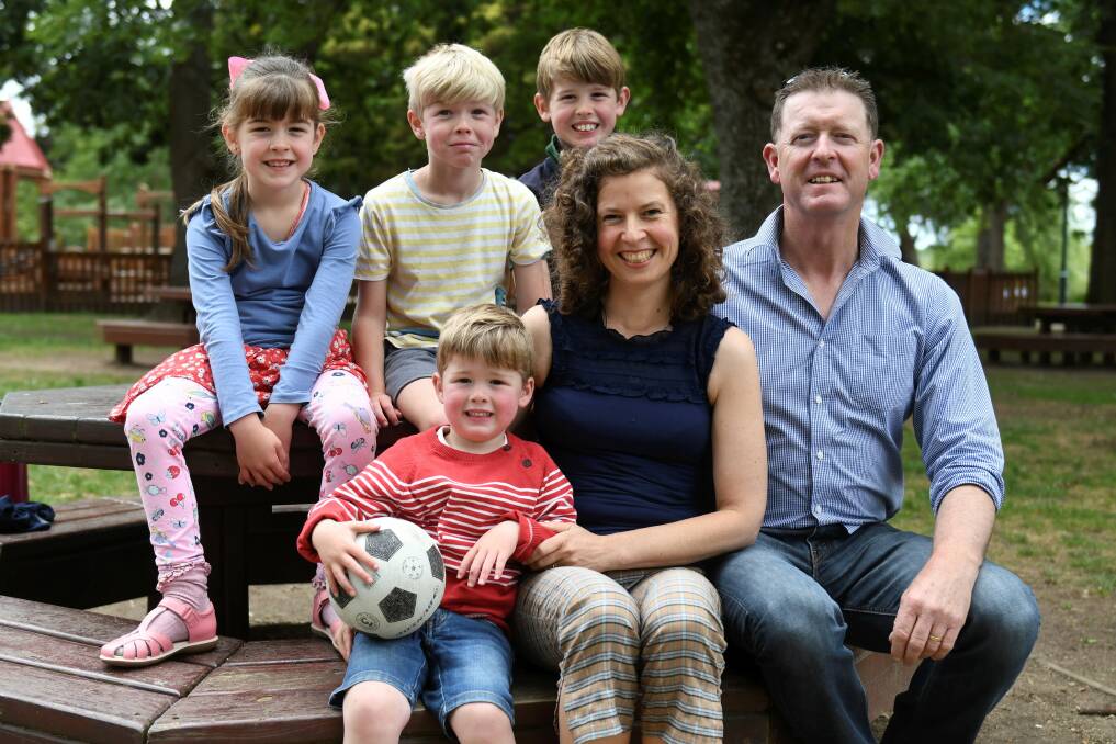 TOGETHER: Kerrie and Brendan Mulcahy with children Sebastian (front), Emily, Hamish and Thomas plea to the community to help find a cure for cancer after their own horror story. Picture: Lachlan Bence