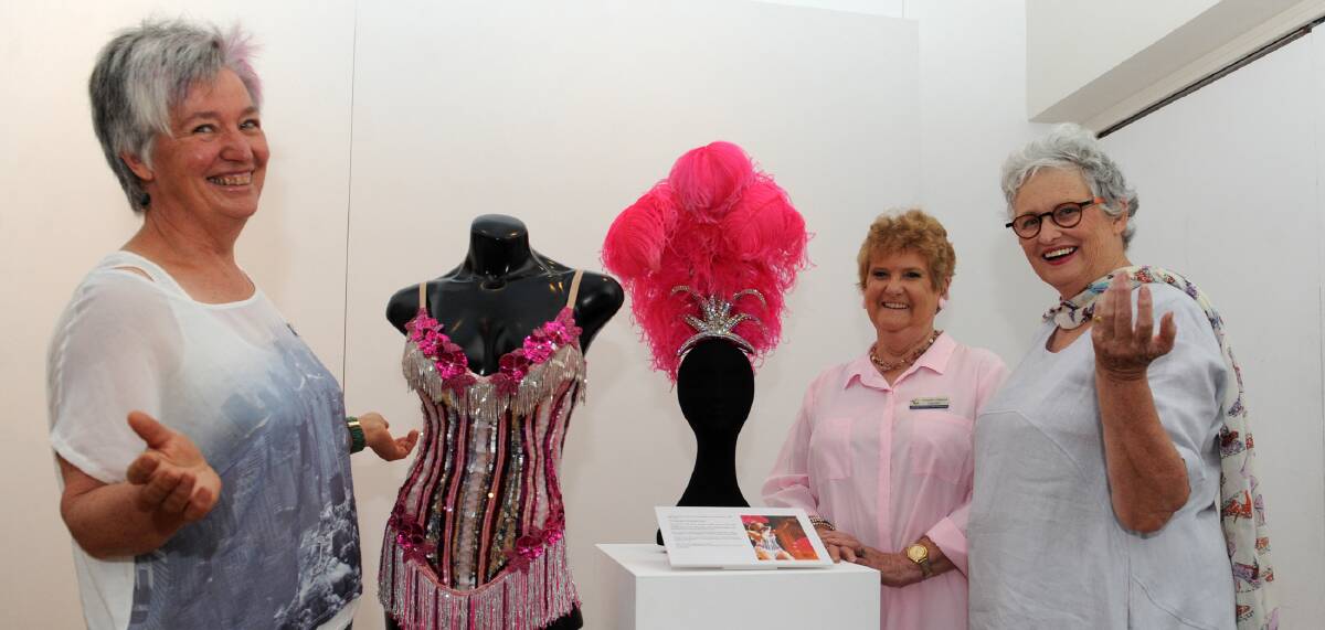 DIVA DELIVERY: Ararat's Sue Kennedy, councillor Gwenda Allgood and Carole Mules get a sneak preview of Kylie's costumes. Picture: OLIVIA PAGE