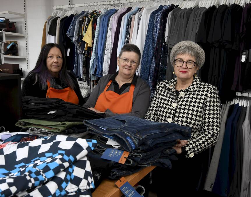 WORKING TOGETHE: Cafs chief executive officer Wendy Sturgess with Thread Together volunteers Sue Freeman and Mary Brierley. Picture: Lachlan Bence