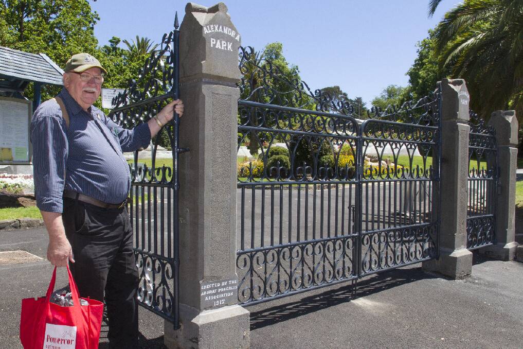 WELL KNOWN: Doug Koschel inspects the new gates at Alexandra Gardens in December 2014. A benefit concert will be hosted for Koschel later this month. Picture: Peter Pickering
