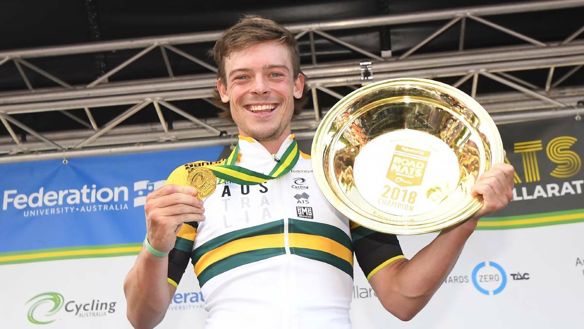 NEW CHAMPION: Alex Edmondson with his gold medal and gold pan after riding the road race of his life. Picture: Dylan Burns
