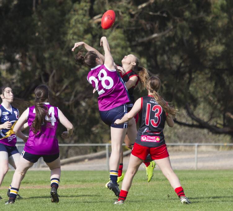 TAP: Ararat Storm's Emma Abraham contests a ruck contest against Carisbrook earlier this season. Picture: Peter Pickering