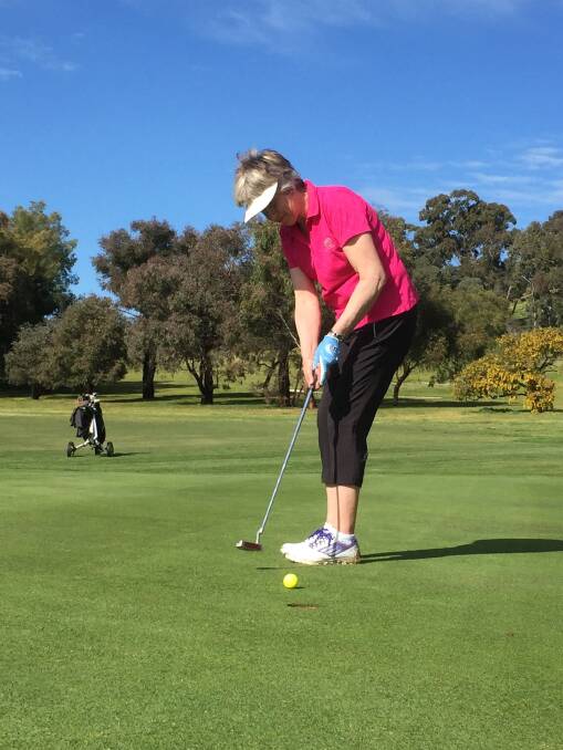 STEADY: Ruth Gellert is focused as she takes her putt at Chalambar Golf Club on Wednesday. Picture: Gayle Dadswell