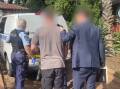 ARRESTED: Counter-terrorism police swooped on the accused at his Tamworth home after months of investigating alleged "extremist" messaging. Photo: NSW Police and AFP