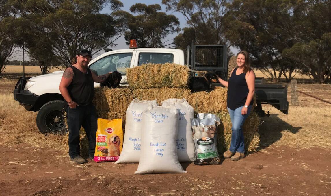 COUNTRY SPIRIT DONATION DRIVE: Warracknabeal's Brock Sturrock and Lah's Nadine Jenkinson with hay, chaff and pet feed bound for Albury. Picture: CONTRIBUTED