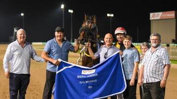 Trainer Paul Males, driver Michael Bellman and part-owner Rob Auber will take their golden ticket straight into the $200,00 NSW Pacers Derby Final on March 9 following Sergeant Lou's victory. Picture supplied by Club Menangle