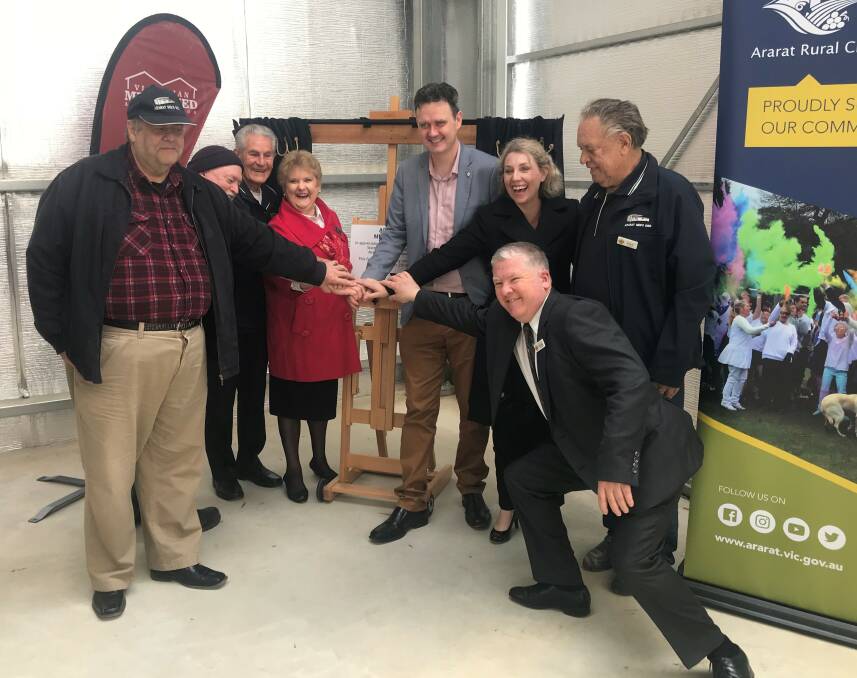 NEW HOME: Ararat Men's Shed members with Mayor Gwenda Allgood, Finance Minister Robin Scott and Labor candidate for Ripon Sarah DeSantis at the official opening. Ararat Men's shed will start fresh with a new building. Picture: CASSANDRA LANGLEY