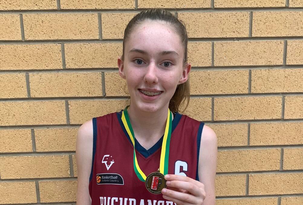REWARD: Victorian Bushranger Taya Chisholm was estatic with her team's gold medal win at the Australian Junior Basketball Country cup. Picture: CONTRIBUTED 