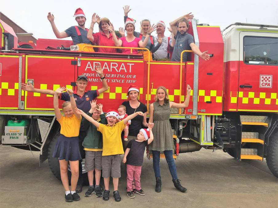 CHRISTMAS JOY: Ararat Country Fire Authority junior and senior firefighters and their families get into the Christmas spirit in 2018.