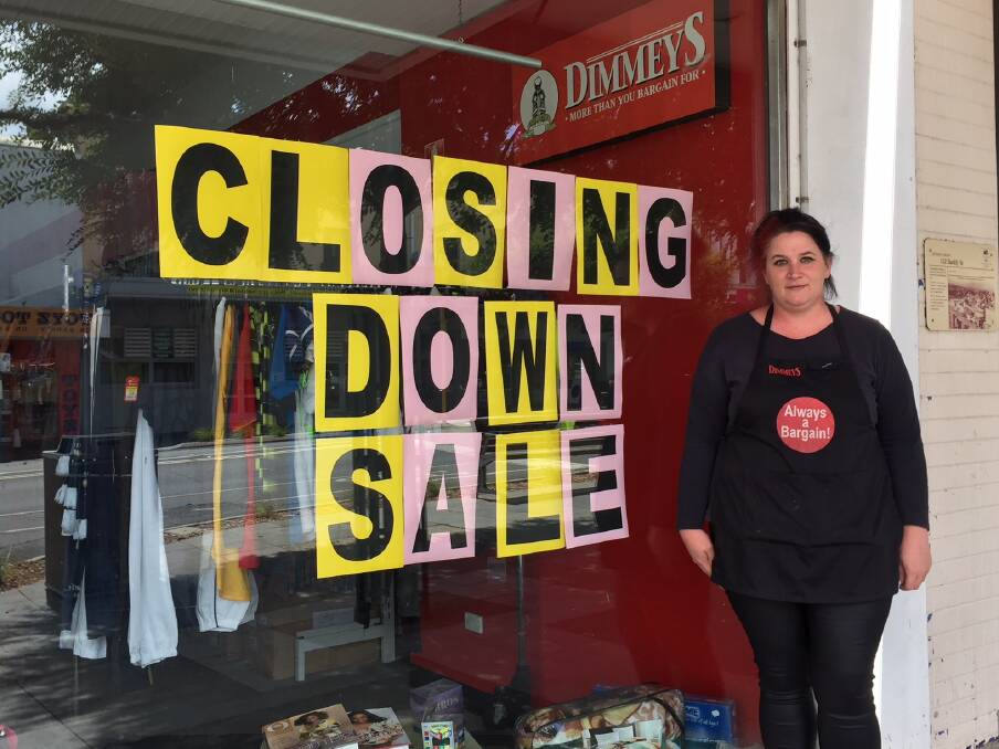 FAREWELL: Ararat's Dimmeys store manager Lisa Townsend regretfully placed a sign in the window of the shopfront after receiving the news of the impending closure.