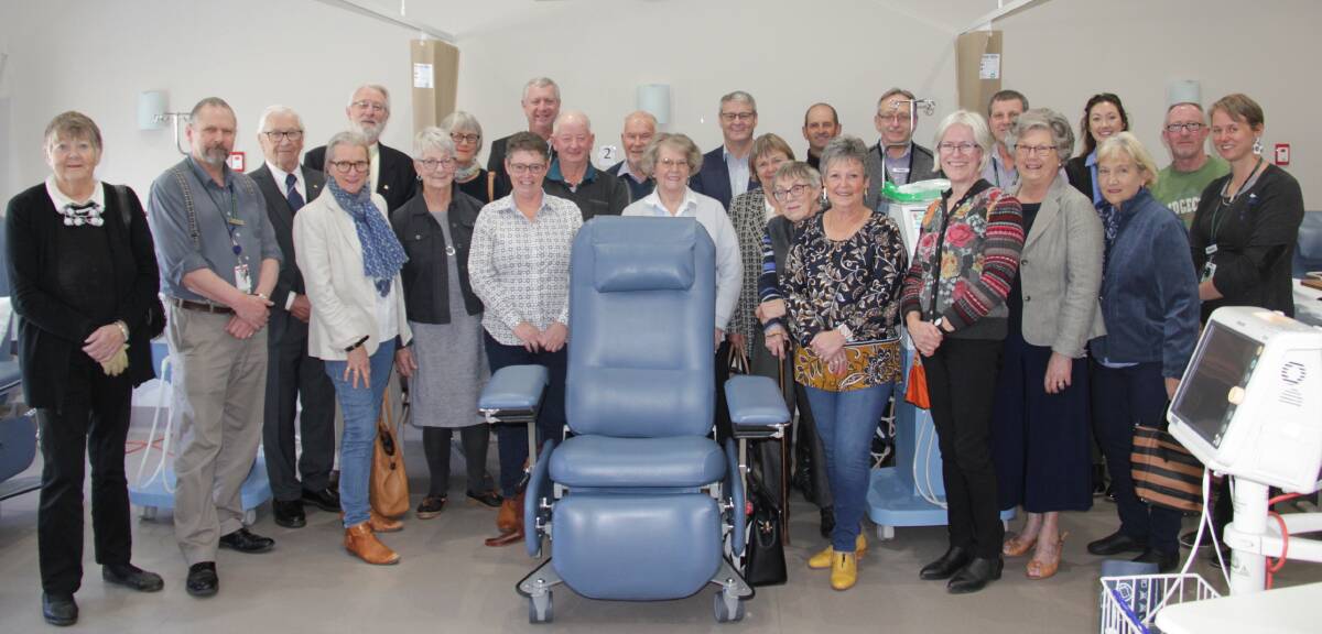 Donors to the EGHS Dialysis Treatment Chair Replacement Project, with one of the new chairs.