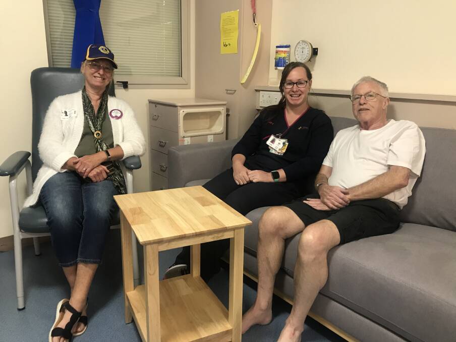 NEW FURNITURE: Stawell Lions Club president Marie Hosking with Stawell Regional Health's acting nurse unit manager Amy Yole with patient Barry trying out the new furniture donated from the Lions Club. Picture: CASSANDRA LANGLEY