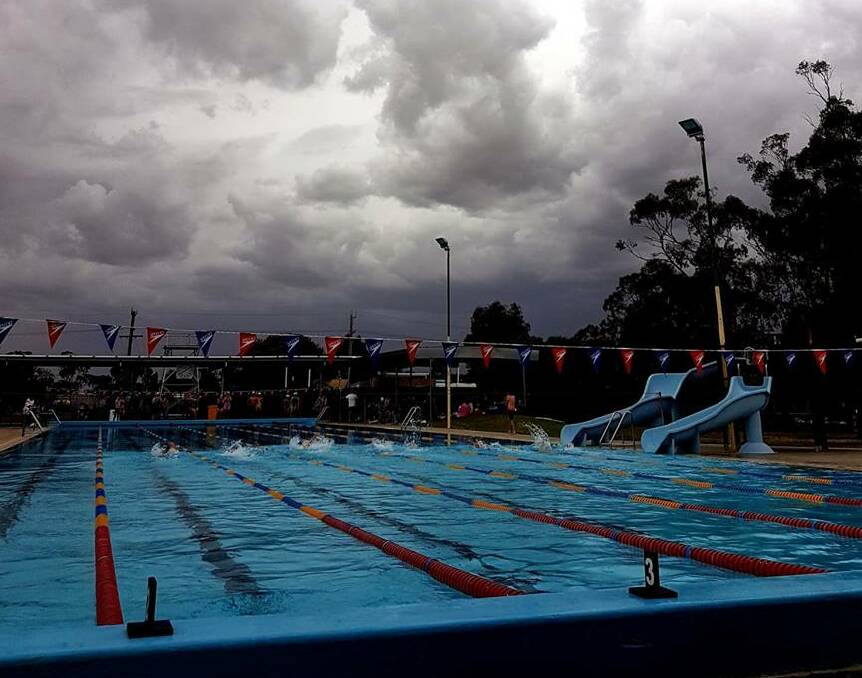 ROLLING IN: A storm rolling in at St Arnaud pool on Saturday. Most of the swim meet had been swam before the meet was cancelled. Picture: AINSLEY CAMERON