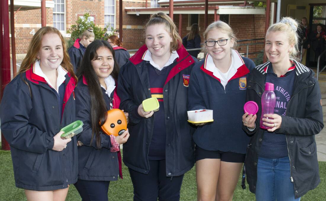 Charlie, Rhianna, Chelsea, Gemma and teacher Heidi Lang doing their bit for the environment. Picture: PETER PICKERING