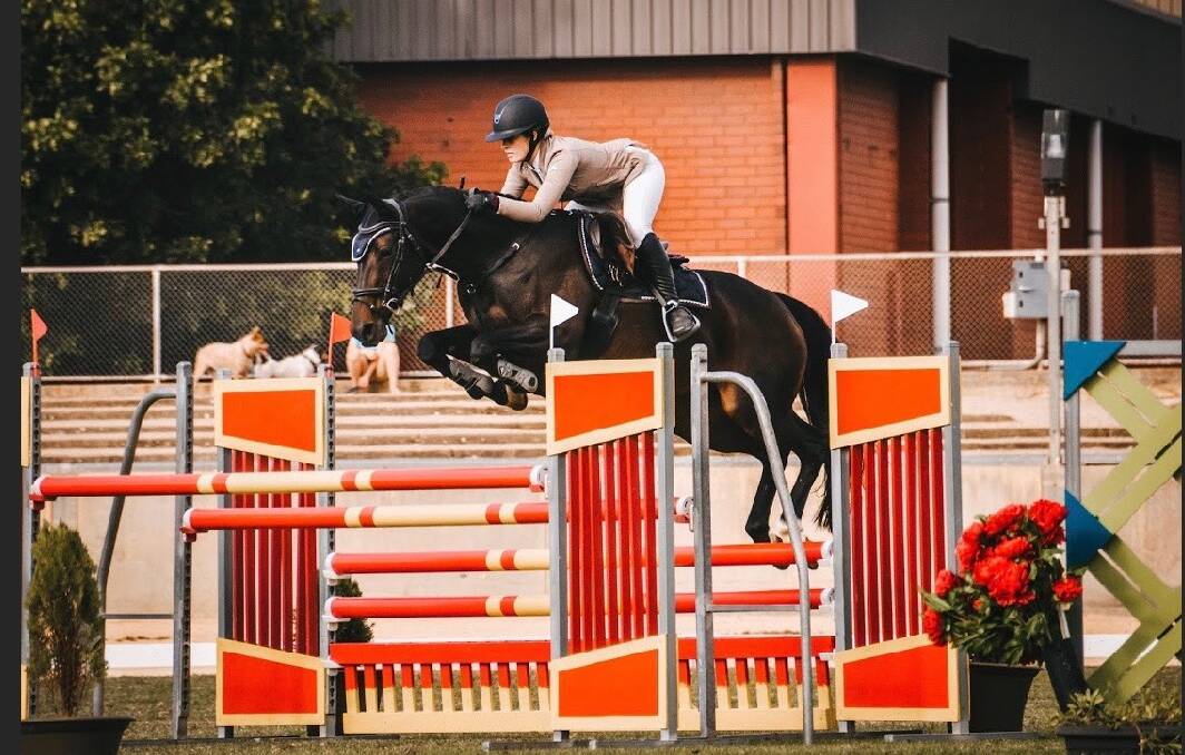 FLYING HIGH: Ararat student Hannah Wigg has won her way through to represent Victoria in show jumping. Picture: CONTRIBUTED