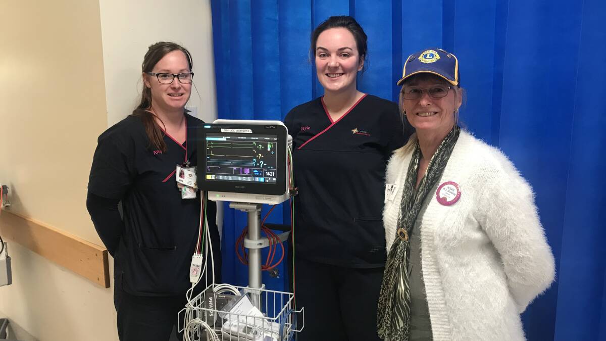UPGRADES: Stawell Regional Health's acting nurse unit manager Amy Yole, registered nurse Dayle Bird and Stawell Lions Club president Marie Hosking with an advanced cardiac monitoring device. Picture: CASSANDRA LANGLEY