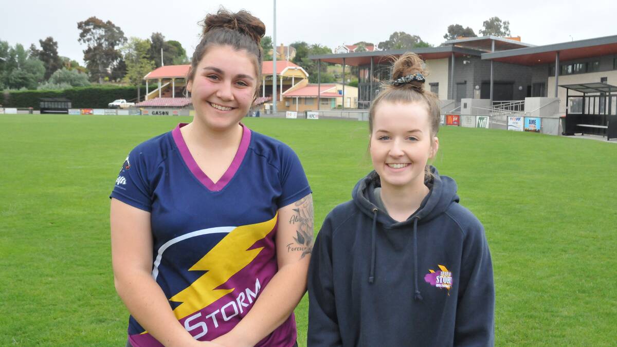 EXCITED: Isabelle Kettle and Lilly Dowling are looking forward
to playing football again. Picture: CASSANDRA LANGLEY